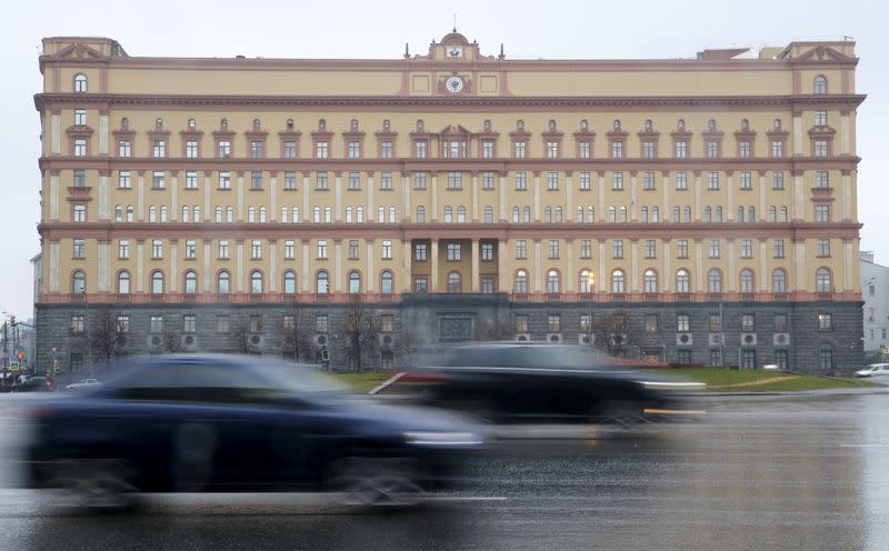 FILE PHOTO: Cars drive past the headquarters of the Federal Security Service (FSB) in central Moscow