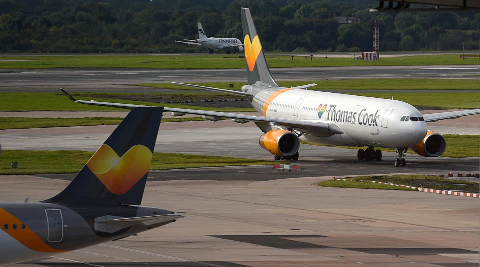 A Thomas Cook passenger aircraft taxis after landing at Manchester Airport on Monday 