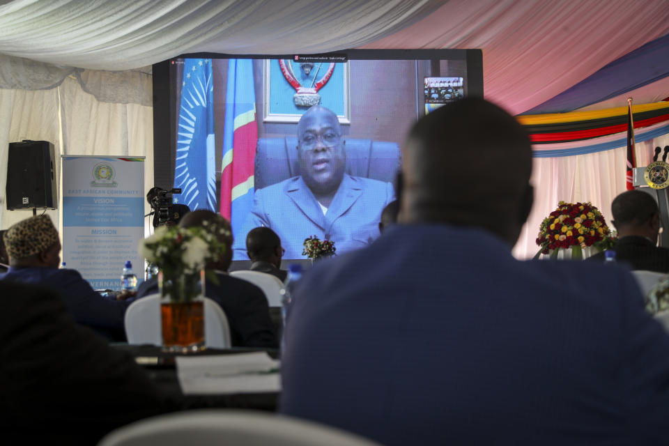 President of Congo Felix Tshisekedi speaks remotely via video call to the Third Inter-Congolese Consultations of the Nairobi Peace Process, the political track, Nairobi III, at a hotel in Nairobi, Kenya Monday, Nov. 28, 2022. The East African Community (EAC) led summit aims to find solutions to the ongoing armed conflict in Eastern Congo. (AP Photo/Brian Inganga)