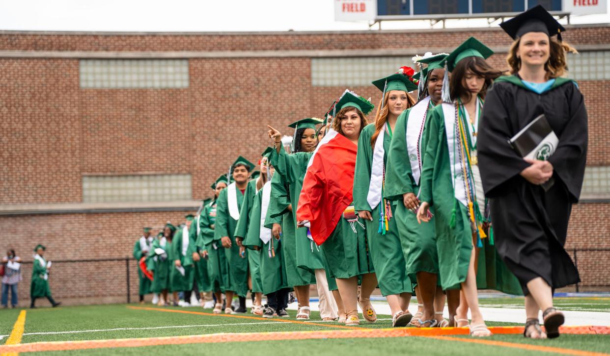 Washington High School seniors are led to their commencement ceremony on Saturday, June 11, 2022 at TCU School Field. 
