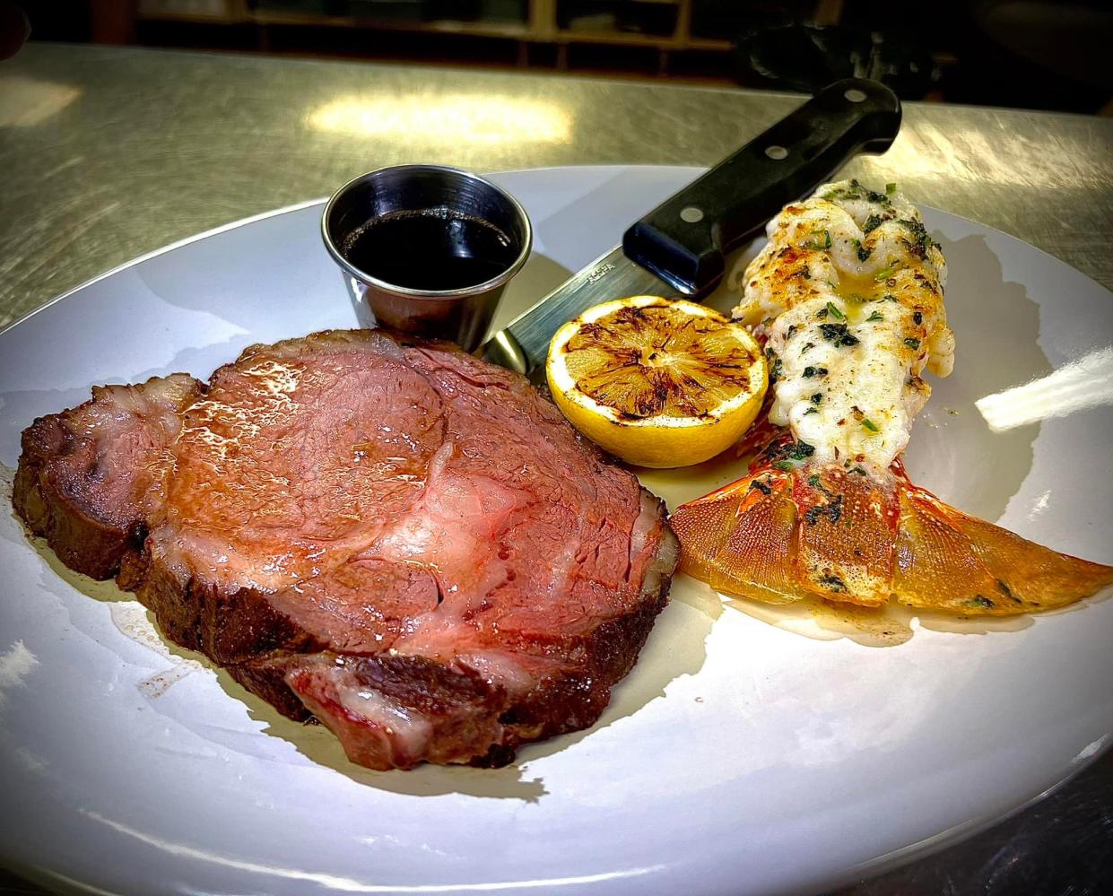 Herb-roasted prime rib and garlic butter basted lobster at Filet Steakhouse in Ankeny.