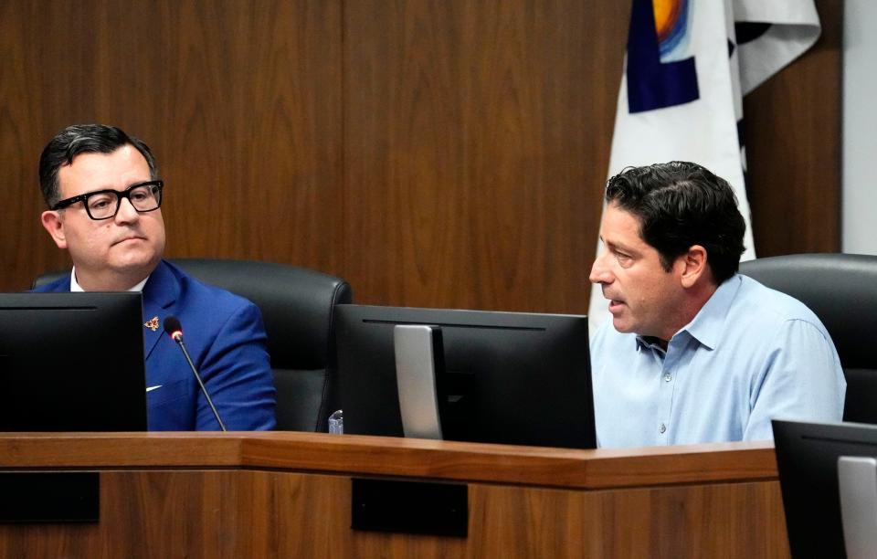 Tempe City Council member Joel Navarro (right) speaks for the project supporters of the Arizona Coyotes $2.1 billion deal. If approved by residents, it would include a professional hockey arena, nearly 2,000 apartments and an entertainment district on 46 acres of city-owned land west of Tempe Town Lake.
