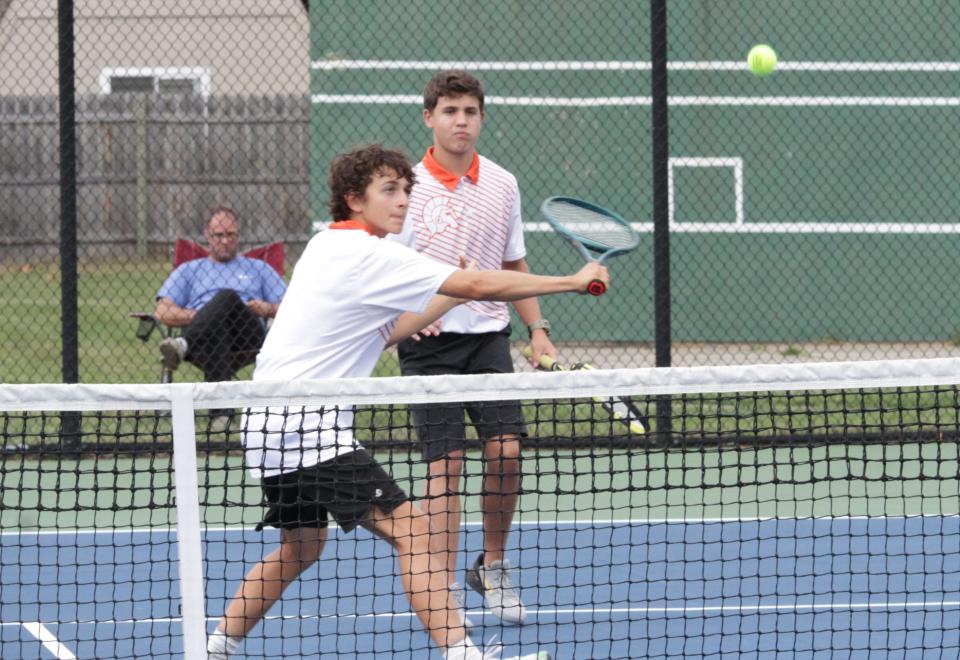 Alex Cypher and Andrew Scheske won their match at first doubles over Edwardsburg on Wednesday.