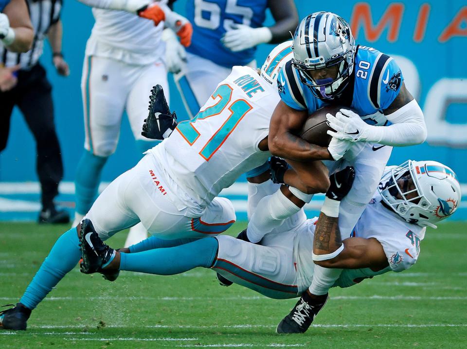 Ameer Abdullah makes a run against the Miami Dolphins.