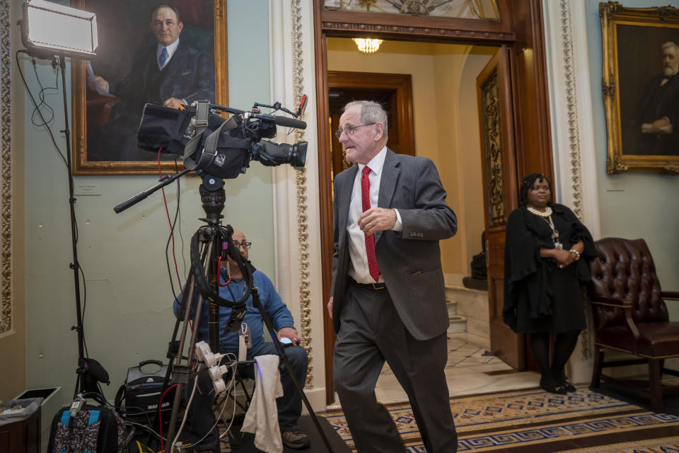 File - In this Jan. 21, 2020, file photo, Sen. Jim Risch, R-Idaho, leaves the Senate chamber during the impeachment trial of President Donald Trumpat the Capitol in Washington. The seven House Democratic impeachment managers have used long speeches to explain why President Donald Trump should be removed from office. Republican senators sitting through their chamber's trial largely considered Democrats' arguments tedious and unpersuasive. (AP Photo/J. Scott Applewhite, File)