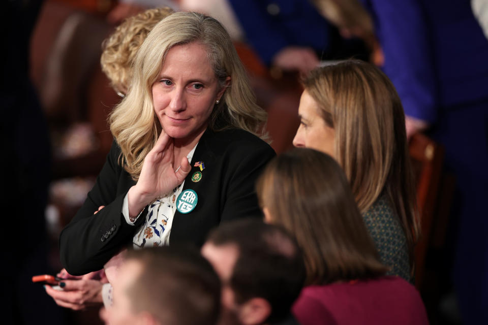 WASHINGTON, DC - FEBRUARY 07: U.S. Rep. Abigail Spanberger (D-VA) talks to fellow Representatives prior to U.S. President Joe Biden's State of the Union address during a joint meeting of Congress in the House Chamber of the U.S. Capitol on February 07, 2023 in Washington, DC. The speech marks Biden's first address to the new Republican-controlled House. (Photo by Win McNamee/Getty Images)