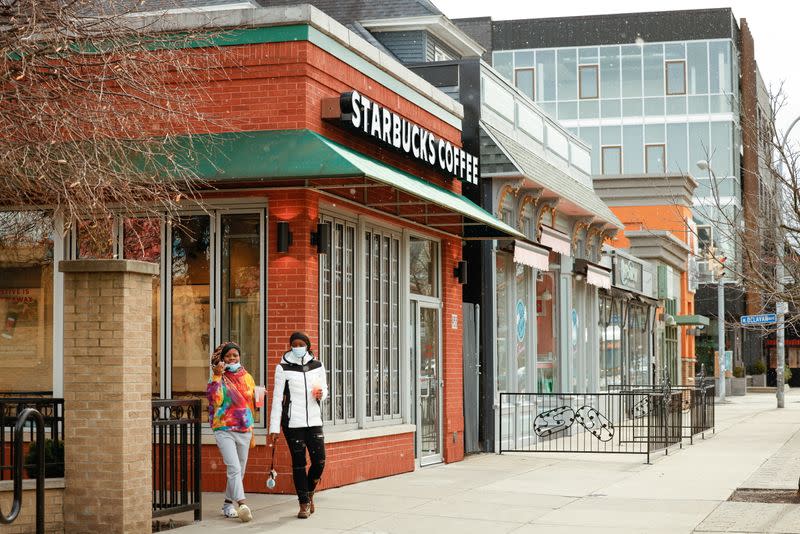 FILE PHOTO: Customers exit a Starbucks in Buffalo, New York