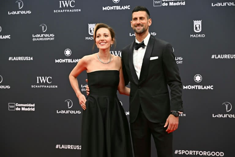 Serbian tennis great Novak Djokovic and his wife Jelena posed on the Red Carpet ahead of the 25th Laureus World Sports Awards (JAVIER SORIANO)