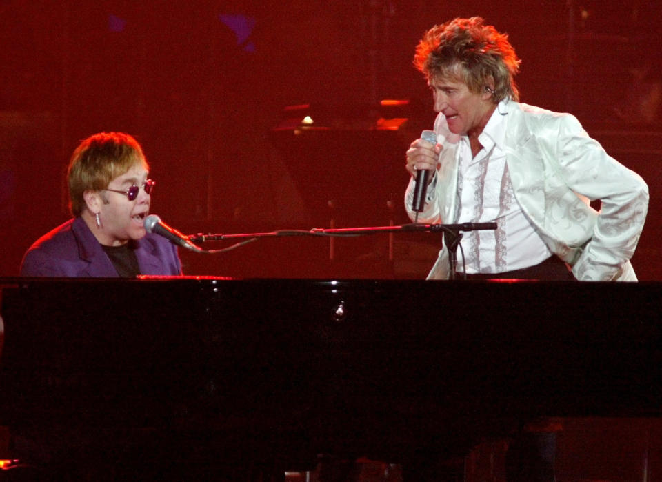 Elton John (L) sings a duet with Rod Stewart during the Andre Agassi
Grand Slam For Children concert at the MGM Grand Hotel and Casino in
Las Vegas, Nevada September 28, 2002. The fundraiser benefits the Andre
Agassi Charitable Foundation, a not-for-profit organization that
assists at-risk children in Las Vegas, where Agassi was raised. The
concert, related auctions and other donations raised a record $5.6
million. REUTERS/Steve Marcus

SM/WS