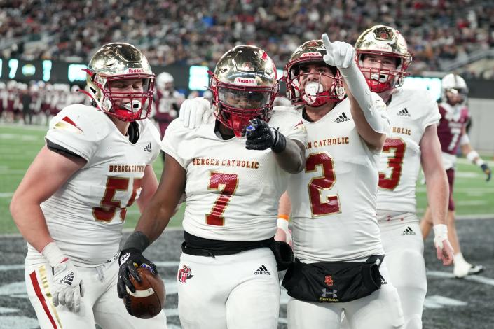 Don Bosco vs. Bergen Catholic in the Non-Public A football championship on Friday, November 25, 2022. BC #7 Saeed St.Fleur celebrates with teammates after scoring a touchdown in the second quarter. 