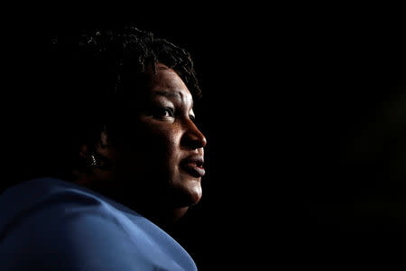 FILE PHOTO: Georgia Democratic gubernatorial nominee Stacey Abrams speaks to supporters during a midterm election night party in Atlanta, Georgia, U.S., November 7, 2018. REUTERS/Leah Millis/File Photo