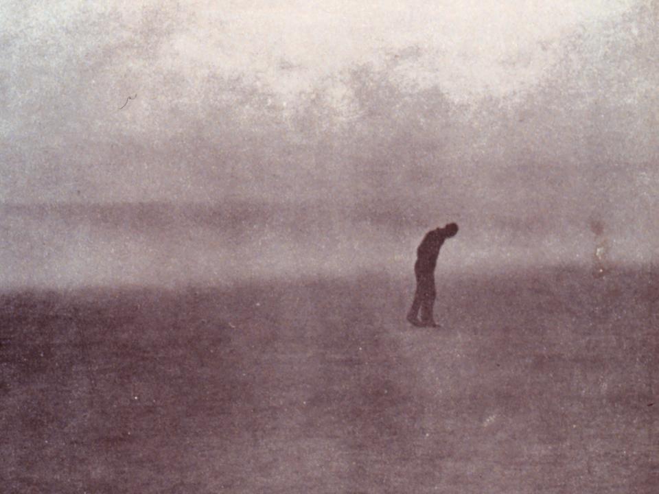 A lone man walks through a dust storm in Dakota in 1935.
