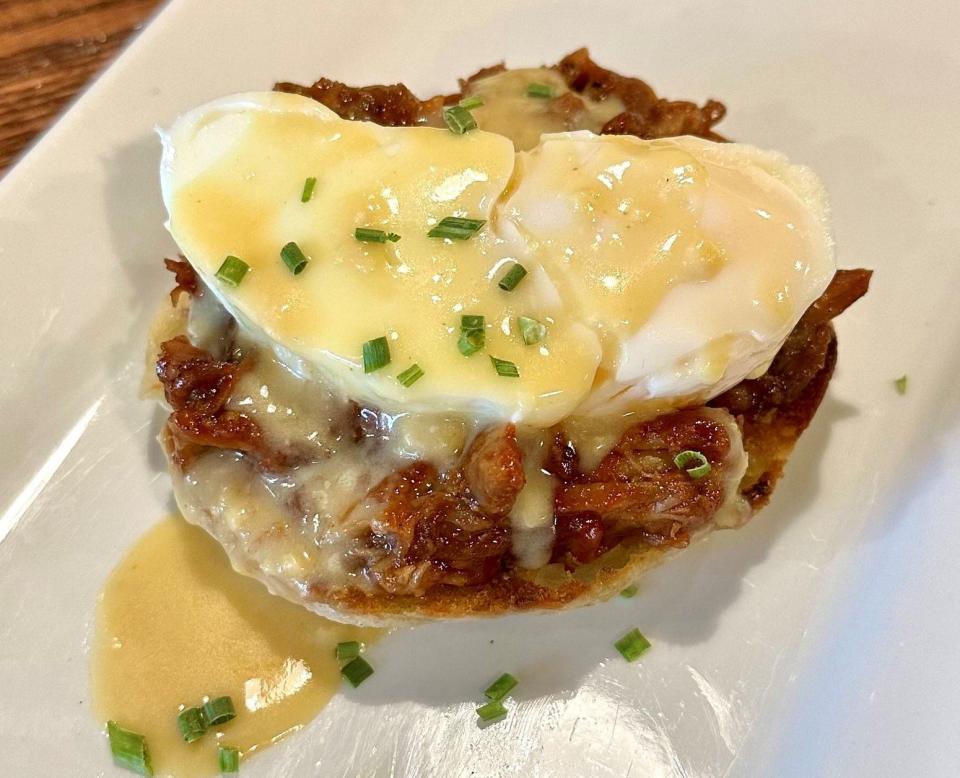 A pulled pork barbecue Benedict at Table of Love, a Southern soul food restaurant, in Hopewell, Va.