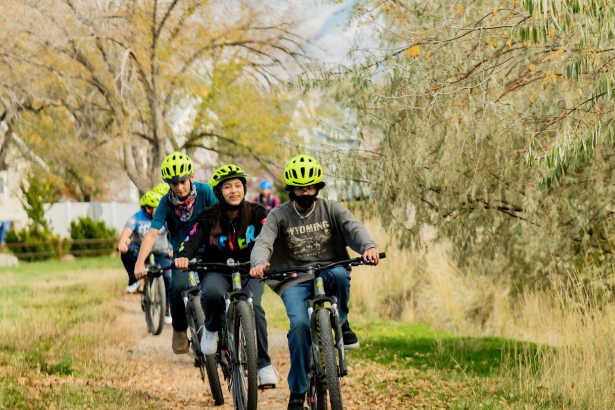 Middle school students ride bikes together in one of the nearly 300 Riding For Focus programs around the U.S. and Canada, now coming to Navarre Middle School in South Bend.