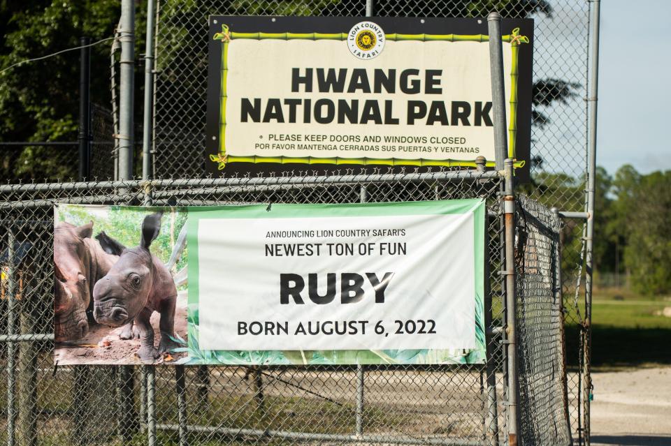 A banner highlighting the 2022 birth of a baby white rhino named Ruby is seen at Lion Country Safari on Thursday, January 5, 2023, in unincorporated West Palm Beach, FL.