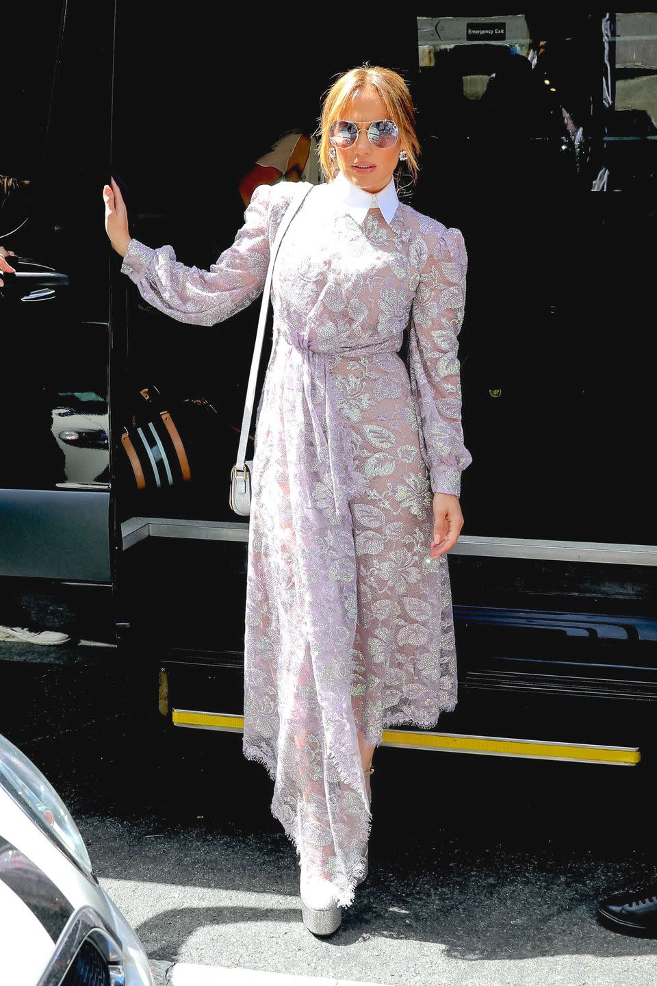 <p>Lopez wore a lilac lace dress with a white collar to the <em>Into the Woods</em> Broadway show. </p>