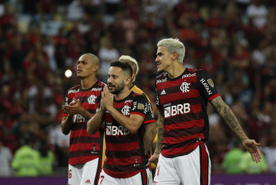 Players of Brazil's Flamengo celebrate winning 2-1 against Argentina's Velez Sarsfield at the end of a Copa Libertadores semifinal second leg soccer match at Maracana stadium in Rio de Janeiro, Brazil, Wednesday, Sept. 7, 2022. Brazil's Flamengo qualified to the final. (AP Photo/Bruna Prado)