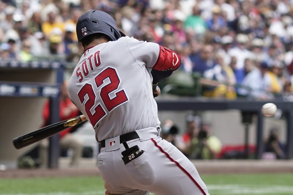 Washington Nationals' Juan Soto hits a two-run scoring single during the fourth inning of a baseball game against the Milwaukee Brewers Sunday, May 22, 2022, in Milwaukee. (AP Photo/Morry Gash)