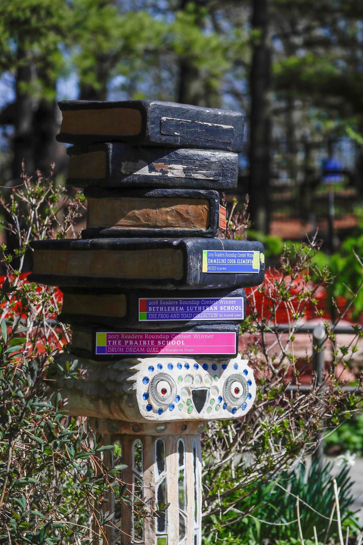 A stack of book sculpture at Bookworm Gardens, Wednesday, May 10, 2023, in Sheboygan, Wis.