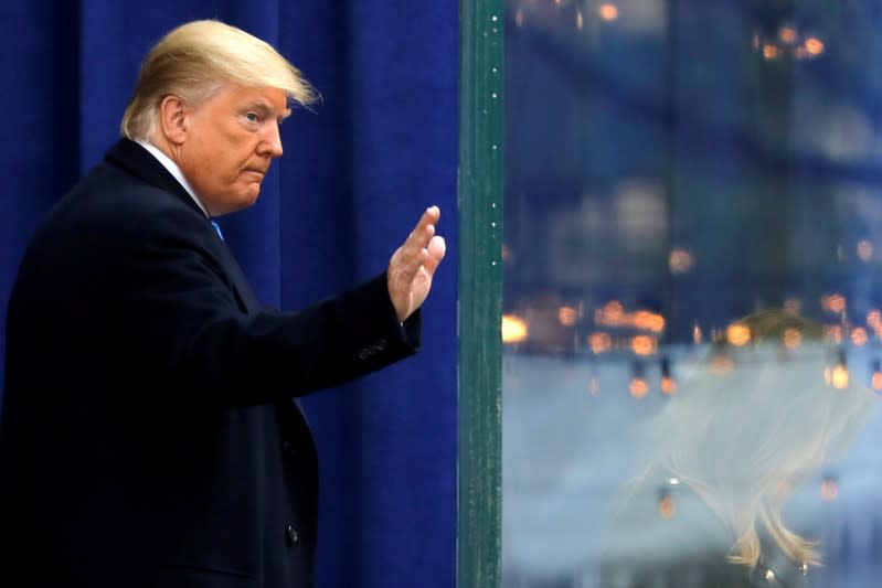 U.S. President Donald Trump gestures while exiting a Veterans Day Parade and Wreath Laying ceremony in Manhattan, New York City