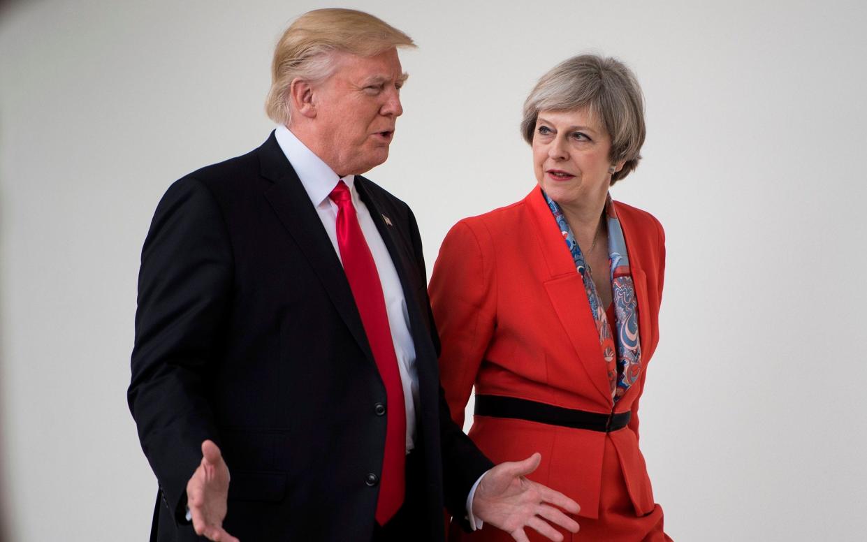 Mrs May was the first foreign leader to visit the US president, in January 2017 - AFP