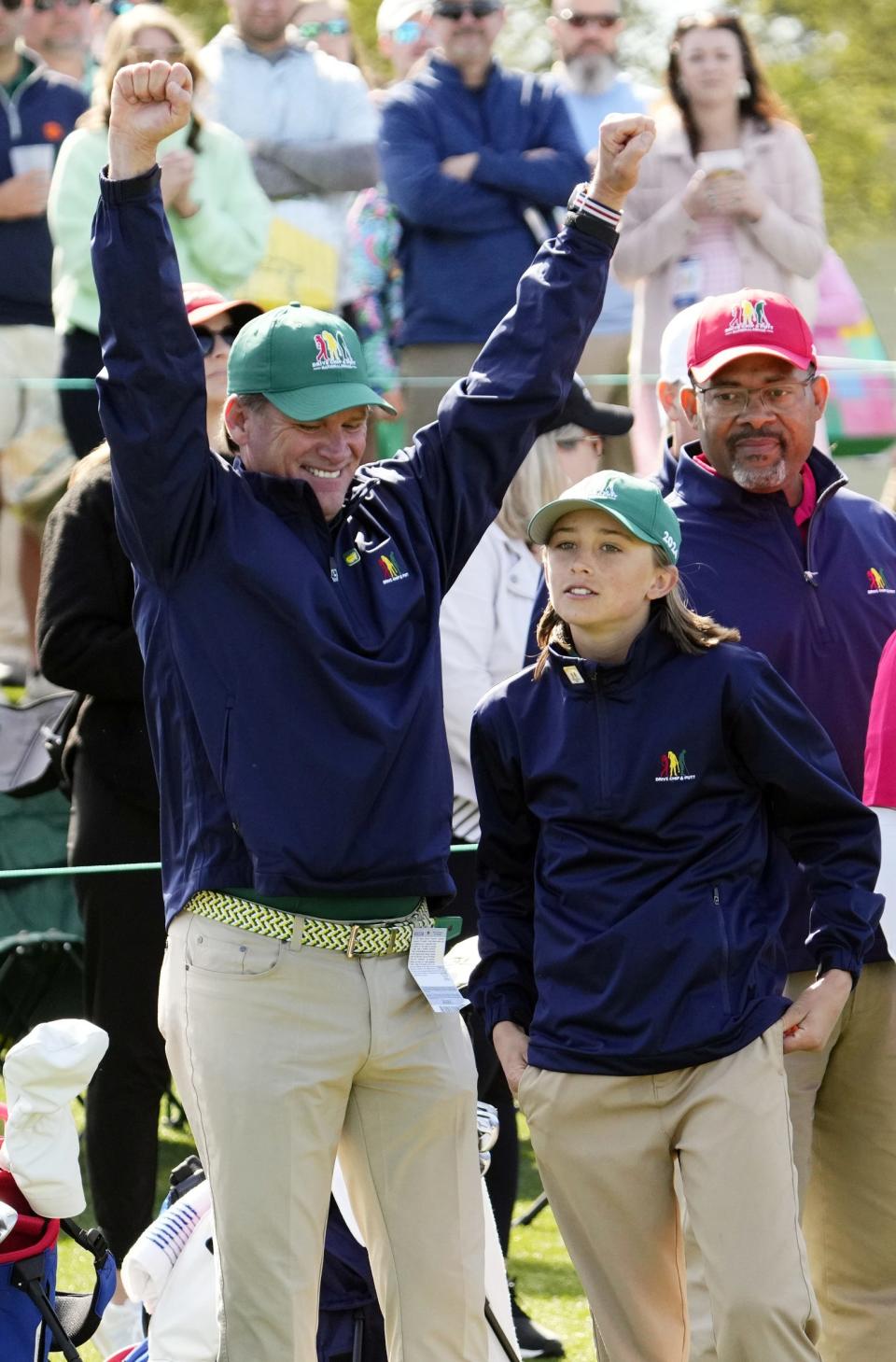 Kipp Madison and his father react after he became the boys 12-13 overall winner during the Drive, Chip & Putt National Finals competition Sunday at Augusta National Golf Club. The Evans resident is the first Augusta-area player to win their age group in the 10-year competition.