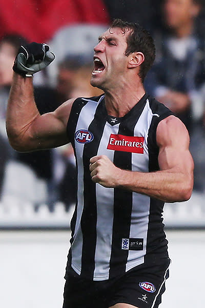 Travis Cloke and Jordan Lewis tested each other all day, but Cloke did best with five handy goals for the Pies.