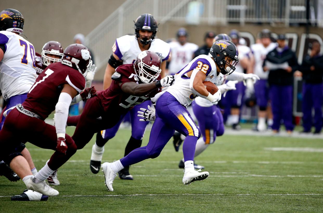 Missouri State's Eric Johnson grabs University of Northern Iowa's Tyler Hoosman's jersey during a game at Plaster Stadium on Saturday, Oct. 26, 2019.