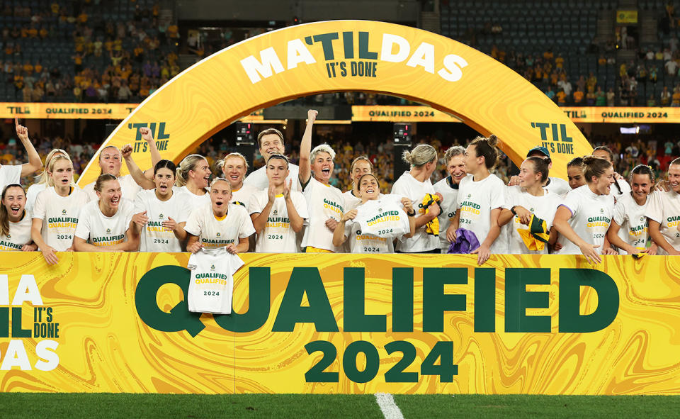 Matildas players, pictured here after securing their spot at the Paris Olympics.