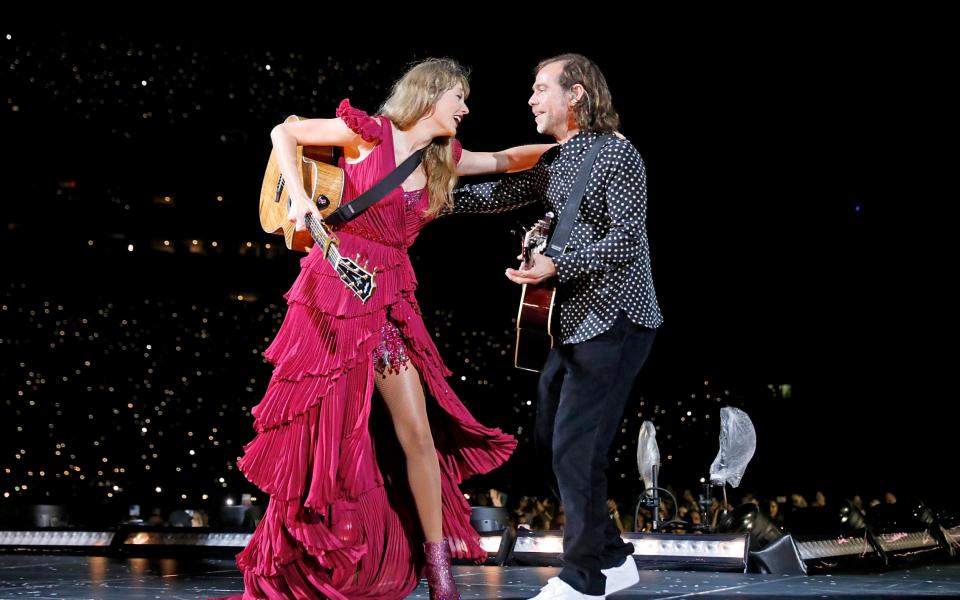 Taylor Swift and Aaron Dessner on stage in Tampa, Florida