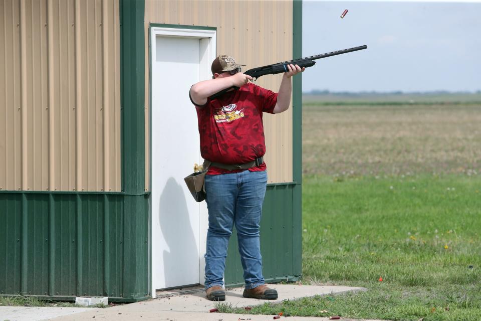 Isaak Jesz of Britton-Hecla shoots at a clay target during the skeet portion of the South Dakota High School Clay Target League State Tournament Friday at the Aberdeen Gun Club.