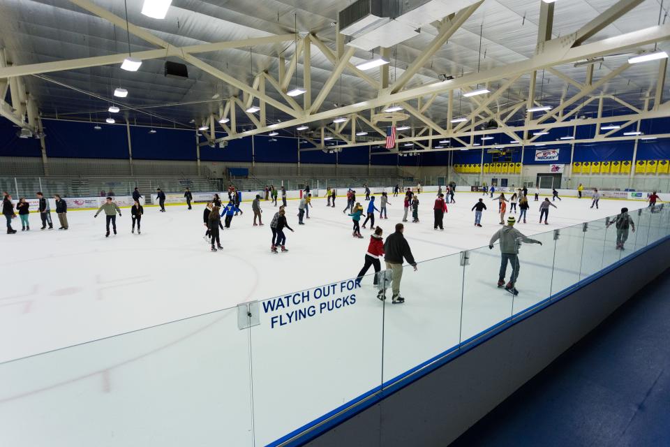 Community members gather for a public ice-skating session at Delaware's Fred Rust Ice Arena