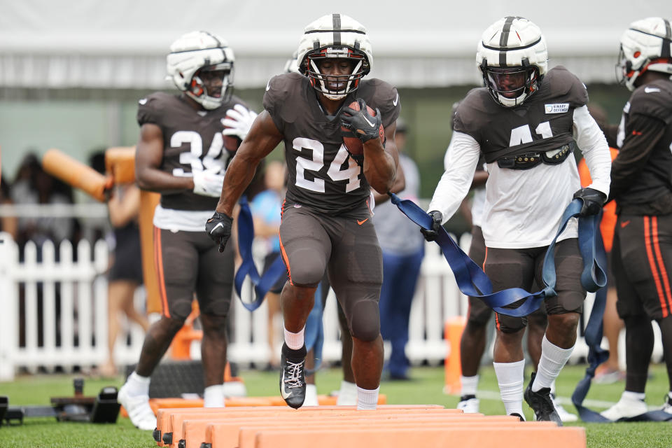 Cleveland Browns running back Nick Chubb (24) participates in a drill during an NFL football camp, Tuesday, Aug. 1, 2023, in Berea, Ohio. (AP Photo/Sue Ogrocki)