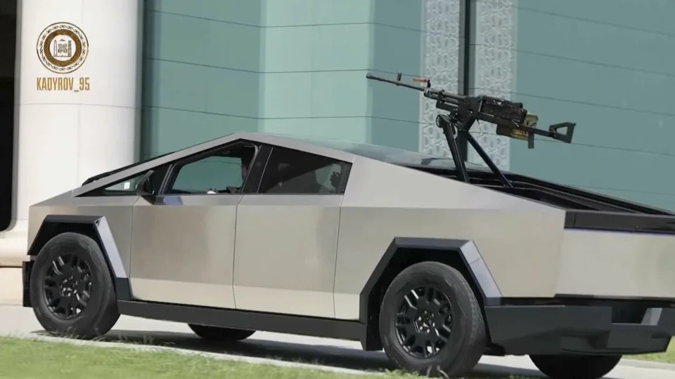 In this image from video posted by Chechen leader Ramzan Kadyrov's Telegram channel on Saturday, Aug. 17, 2024, Kadyrov drives a Tesla Cybertruck equipped with a machine gun in Grozny, Chechnya. (Ramzan Kadyrov Telegram channel via AP)