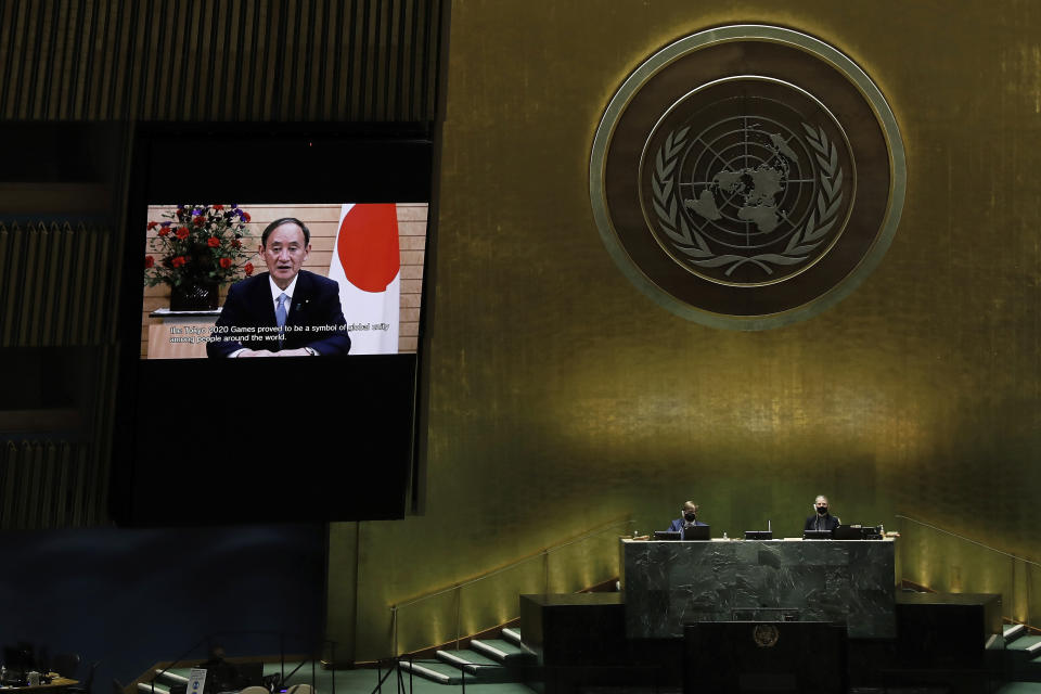 Suga Yoshihide, Prime Minister of Japan, remotely addresses the 76th session of the United Nations General Assembly in a pre-recorded message, Friday Sept. 24, 2021, at UN headquarters. (Peter Foley/Pool Photo via AP)