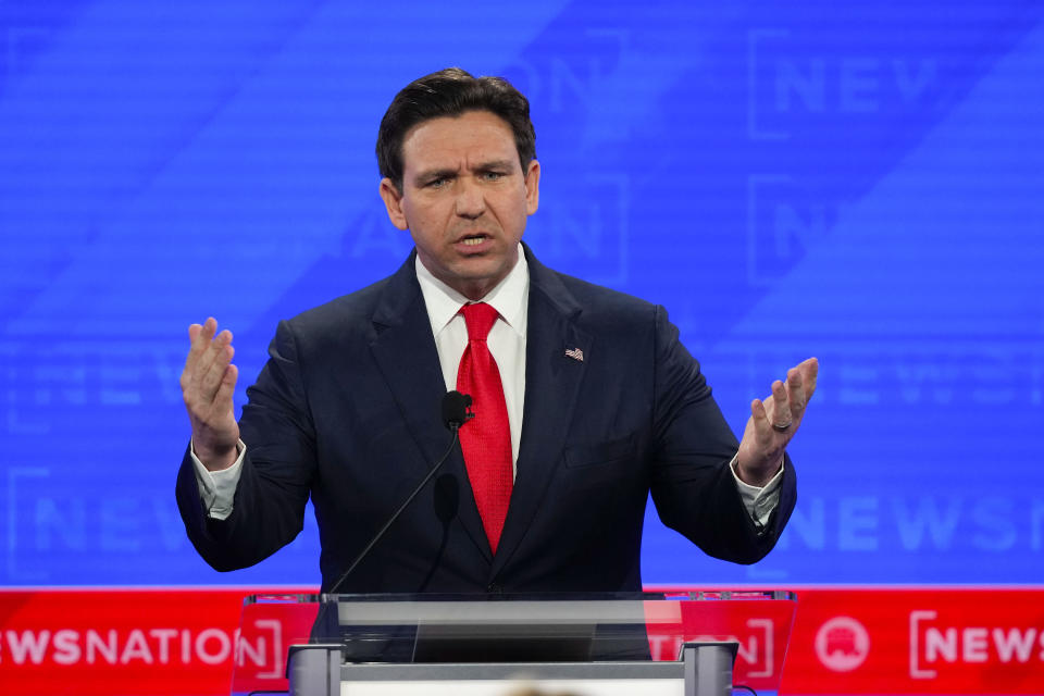 Republican presidential candidate Florida Gov. Ron DeSantis gestures during a Republican presidential primary debate hosted by NewsNation on Wednesday, Dec. 6, 2023, at the Moody Music Hall at the University of Alabama in Tuscaloosa, Ala. (AP Photo/Gerald Herbert)