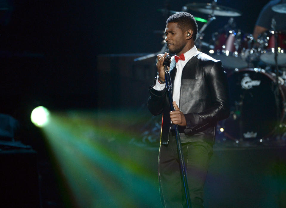 LOS ANGELES, CA - APRIL 18:  Singer Usher performs onstage at the 28th Annual Rock and Roll Hall of Fame Induction Ceremony at Nokia Theatre L.A. Live on April 18, 2013 in Los Angeles, California.  (Photo by Kevin Winter/Getty Images)