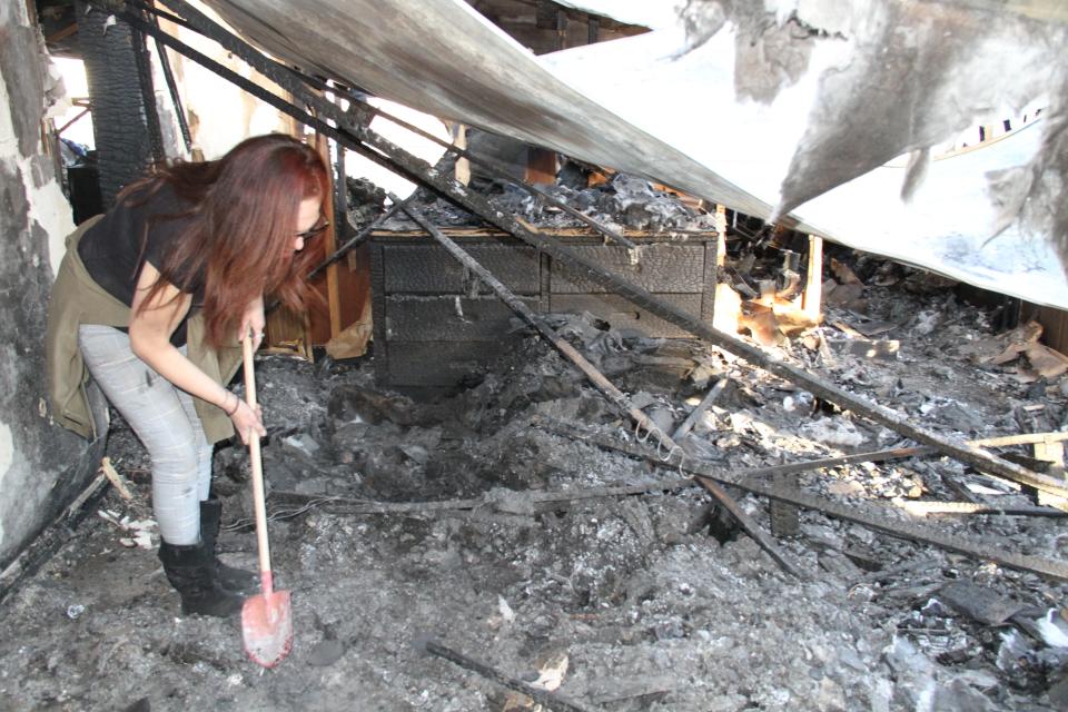 Homeowner London Sifuentes is searching burned debris for any salvageable materials on Friday, Jan. 20. after her home caught fire on Jan. 4 and was ruled an accidental fire.