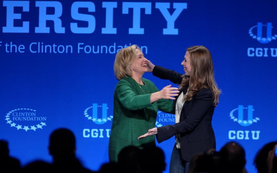 Chelsea Clinton and her mother in 2015 - Credit: Gaston de Cardenas /AP