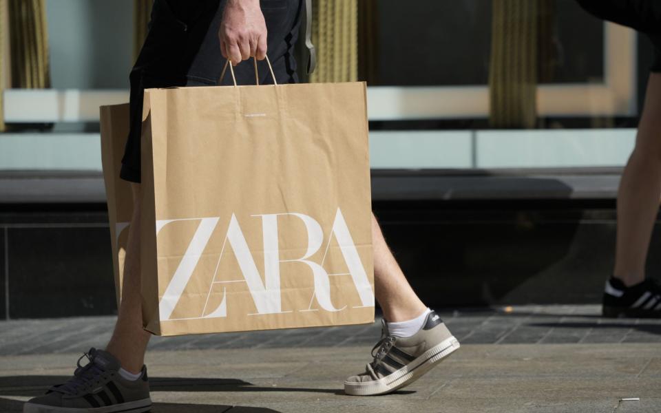 A shopper with a Zara bag in Madrid earlier today