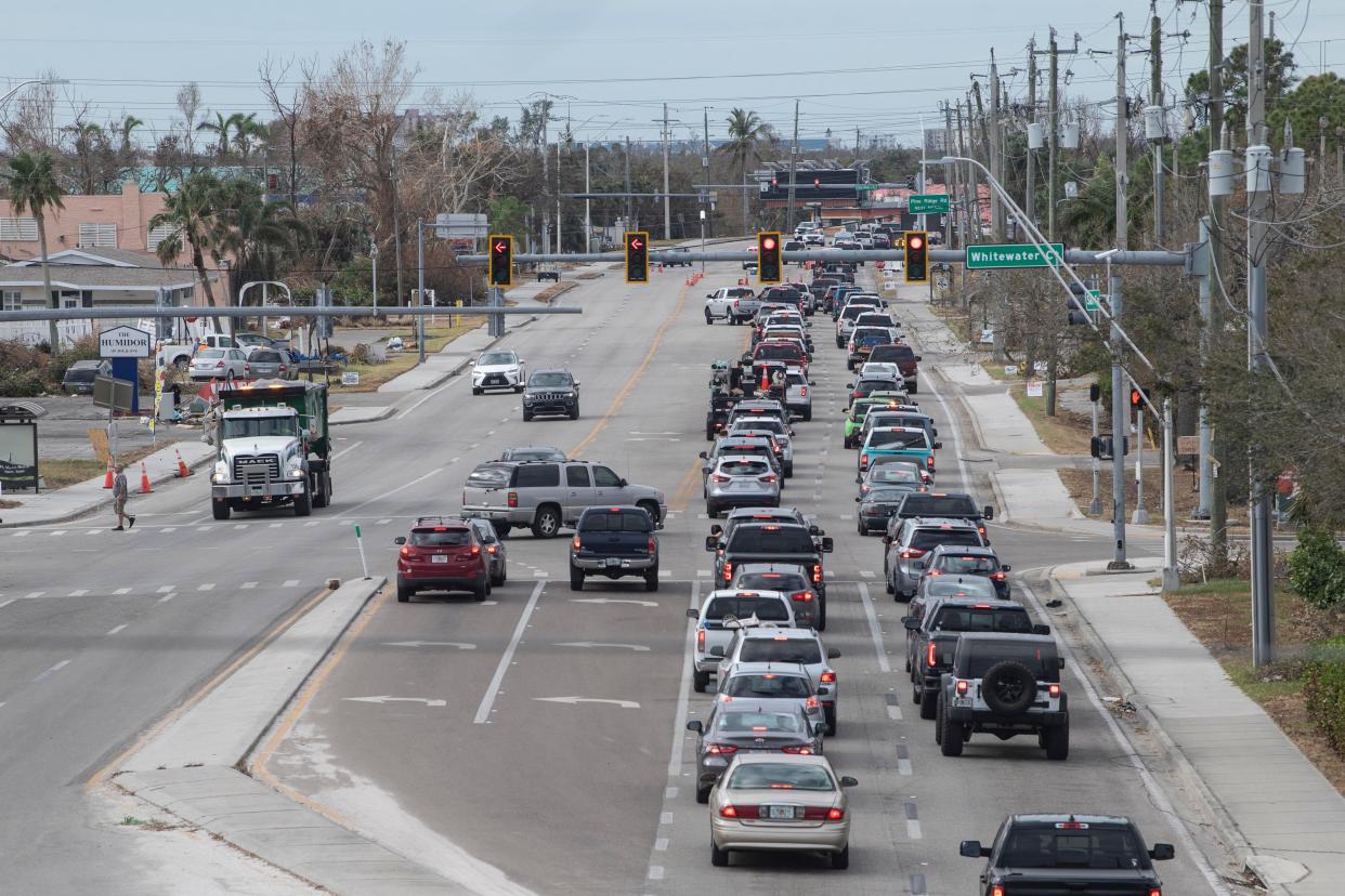 Drivers caught in traffic going south on San Carlos Blvd. at Summerlin Rd. on Sunday, October 9, 2022 towards Fort Myers Beach, Fla.
