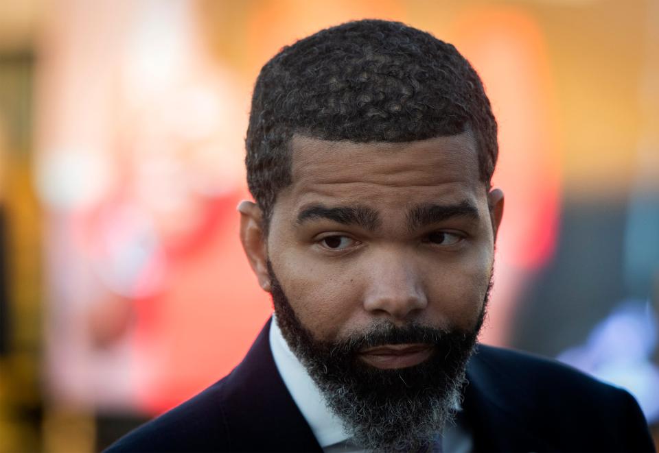 Jackson Mayor Chokwe Antar Lumumba visits with attendees before the State of the City program begins at the Farish Street Courtyard in Jackson on Thursday, Oct. 27.