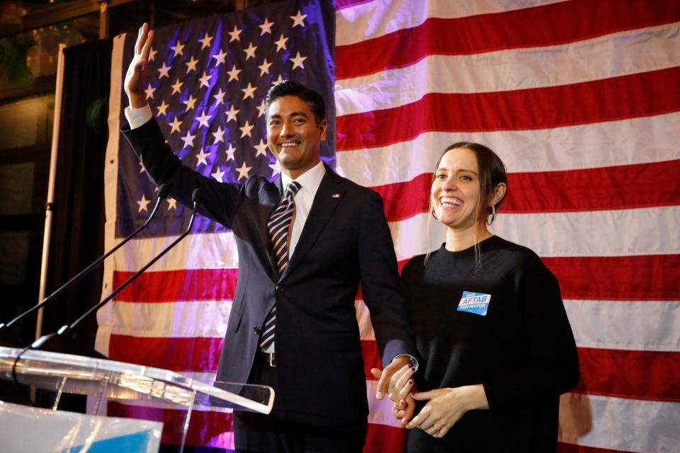 Mayor-elect Aftab Pureval gives a victory speech, with his wife Dr. Whitney Whitis by his side