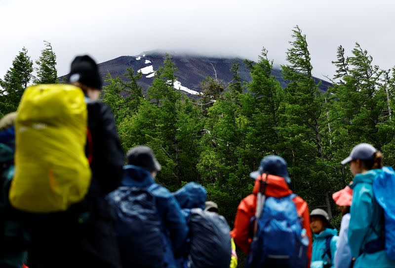 Mount Fuji climbing season starts with new entrance fee as a part of series of trial restrictions to curb overtourism in Fujiyoshida, Japan