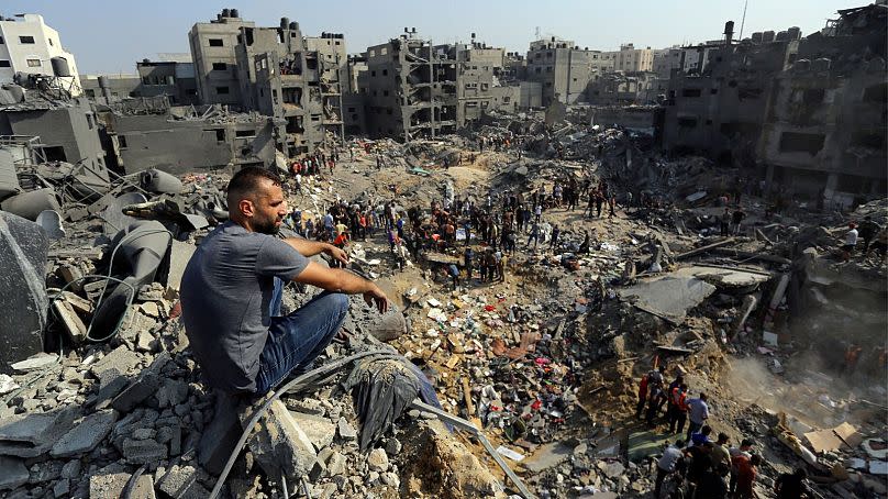 A man surveys the ruins of Jabaliya refugee camp in northern Gaza Strip, 1 November 2023, after it was targeted by Israeli air strikes.