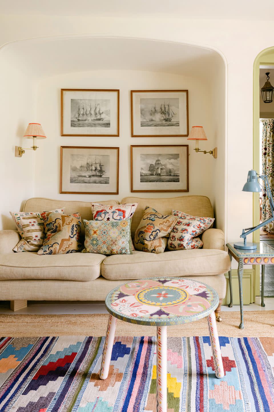 a living room with a couch and a table