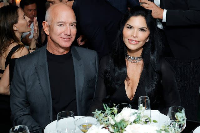 <p>Stefanie Keenan/WireImage</p> Lauren Sánchez and Jeff Bezos at the Chanel and Charles Finch Annual Pre-Oscar Dinner on March 9