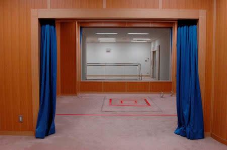 FILE PHOTO : An execution chamber where a trap door is marked with a red square, is seen at the Tokyo Detention Center in Tokyo, Japan, in this undated file handout photo released by the Justice Ministry in August 27, 2010. Justice Ministry/Handout via Reuters/File Photo