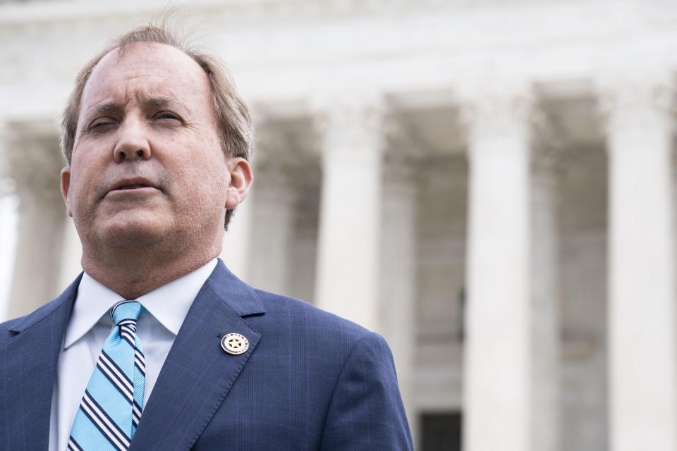 WASHINGTON, DC - ARPIL 26: Texas Attorney General Ken Paxton speaks to reporters after the Supreme Court oral arguments in the Biden v. Texas case at the Supreme Court on Capitol Hill on Tuesday, April 26, 2022 in Washington, DC. (Photo by Sarah Silbiger for The Washington Post via Getty Images)