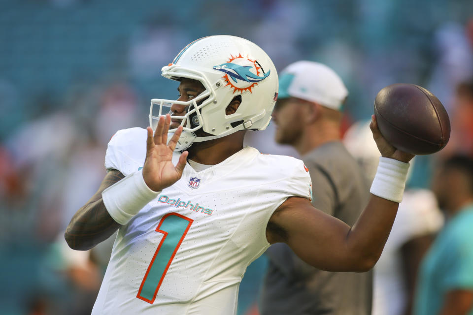 Oct 15, 2023; Miami Gardens, Florida, USA; Miami Dolphins quarterback <a class="link " href="https://sports.yahoo.com/nfl/players/32675" data-i13n="sec:content-canvas;subsec:anchor_text;elm:context_link" data-ylk="slk:Tua Tagovailoa;sec:content-canvas;subsec:anchor_text;elm:context_link;itc:0">Tua Tagovailoa</a> (1) throws the football during warmups prior to the game against the Carolina Panthers at Hard Rock Stadium. Mandatory Credit: Sam Navarro-USA TODAY Sports